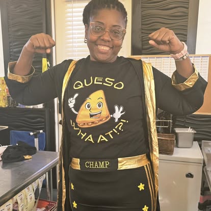 Dressed as the Queso Champ